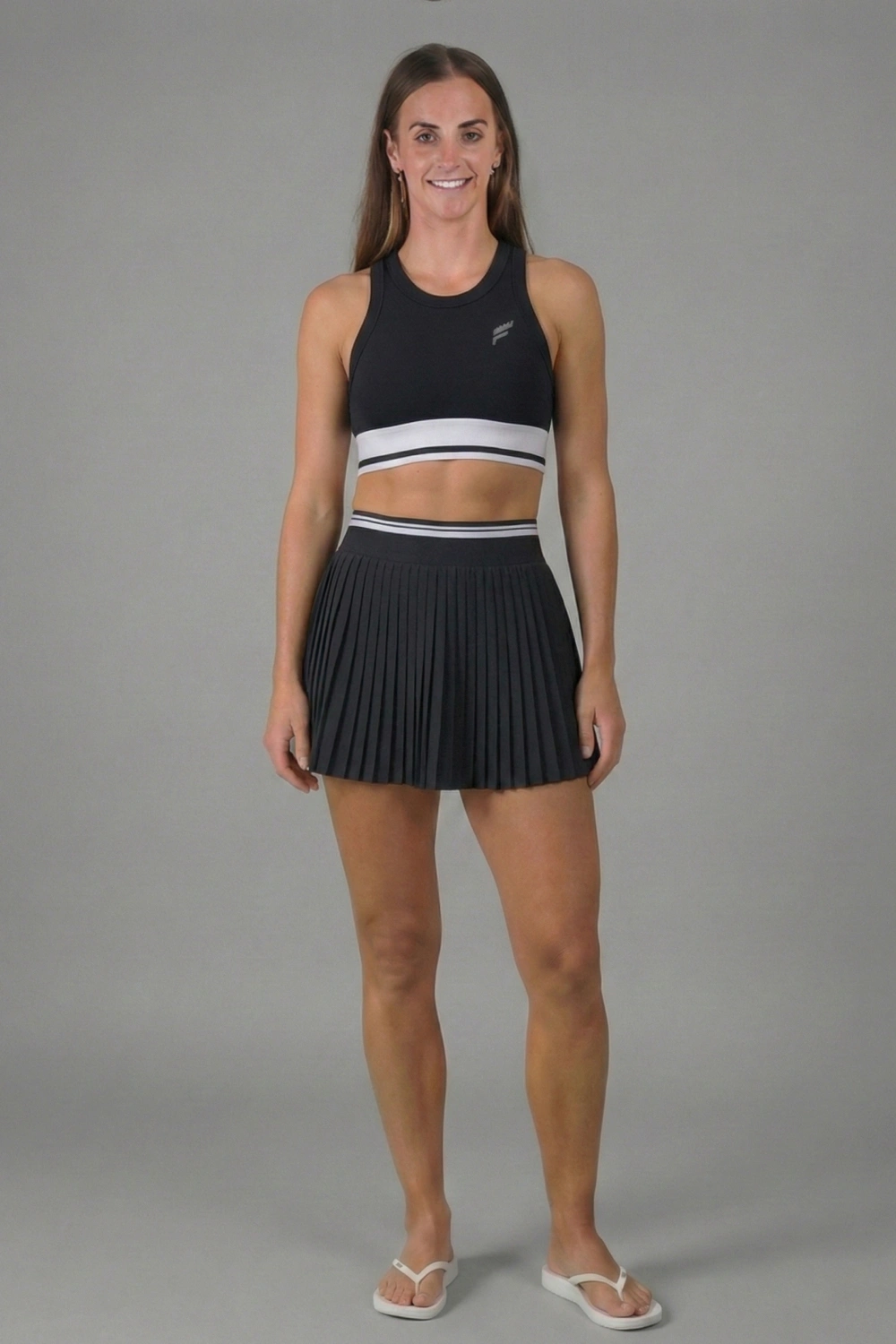 Nicole Nobile Saint-Tropez Signature Set,  Black Ribbed Crop Top & Pleated Skirt, Flow Beach Tennis